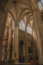 Stained glass, columns and altar at the St. Michael and St. Gudula Cathedral in Brussels. Royalty Free Stock Photo